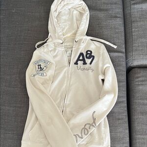 Aeropostale Cream Hoodie with Navy Patch Details